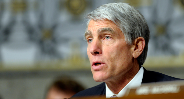 Udall and his staff contend that the 250,000 cancellation notices figure is incorrect. | AP Photo